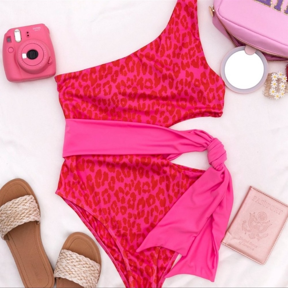 Pink lily swimsuit XS brand new